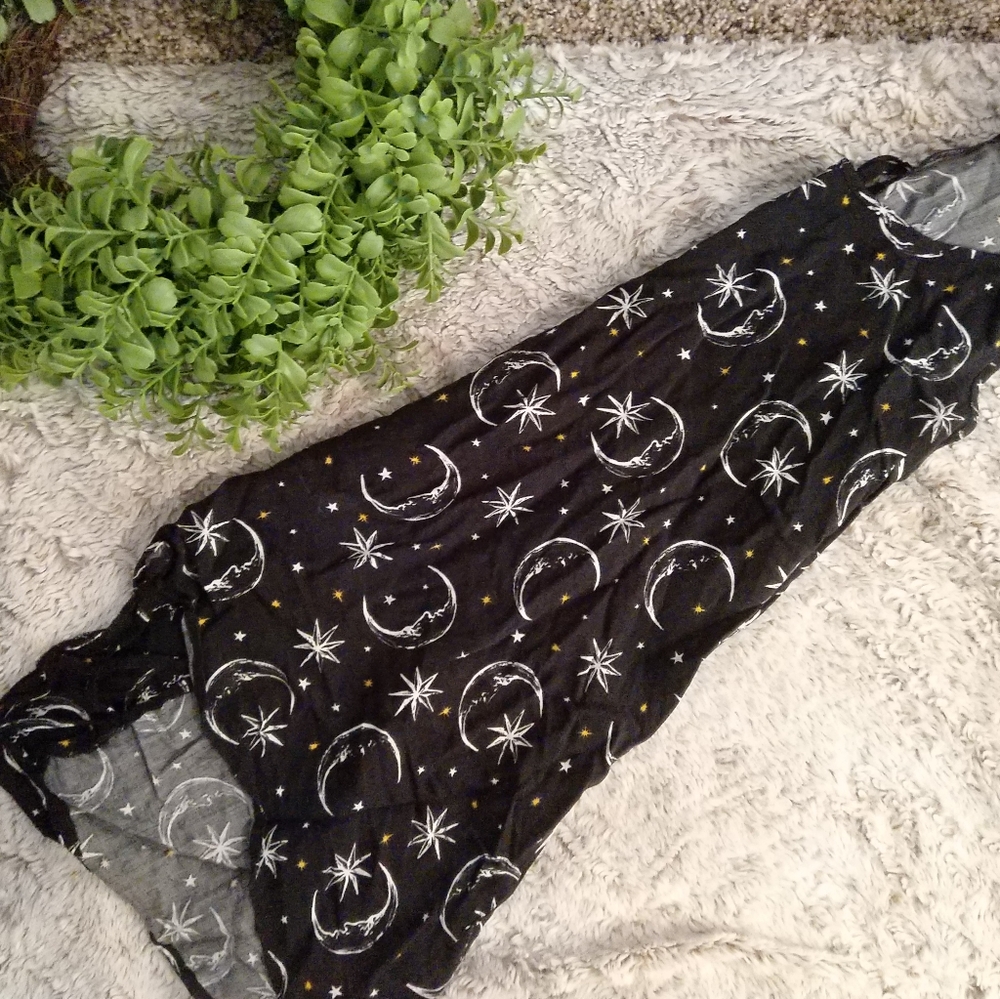 Celestial tank with open back detail